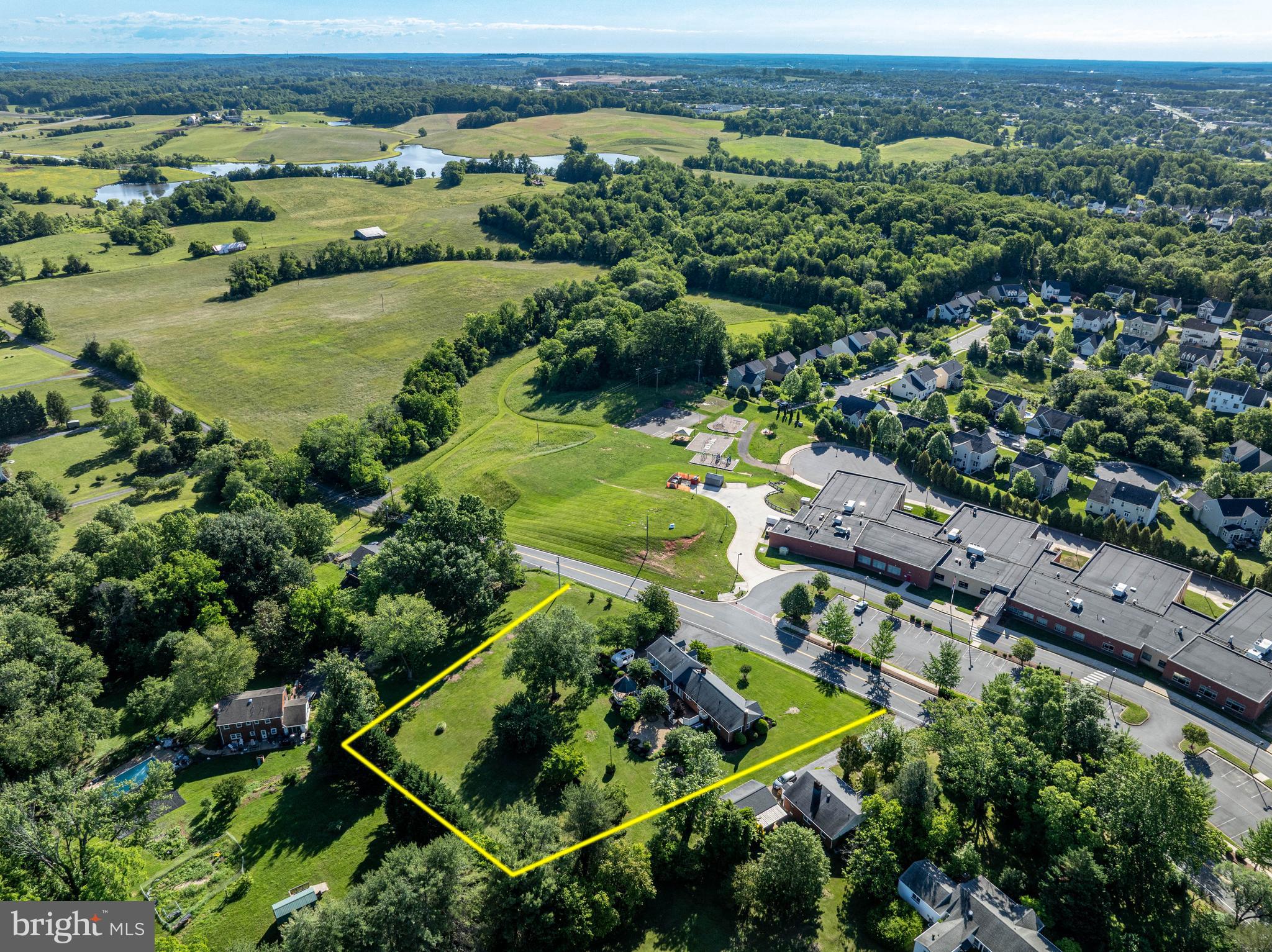 650 Yowell Drive Culpeper, VA 22701 - Photo 63 of 65 an aerial view of a residential houses with outdoor space and trees all around