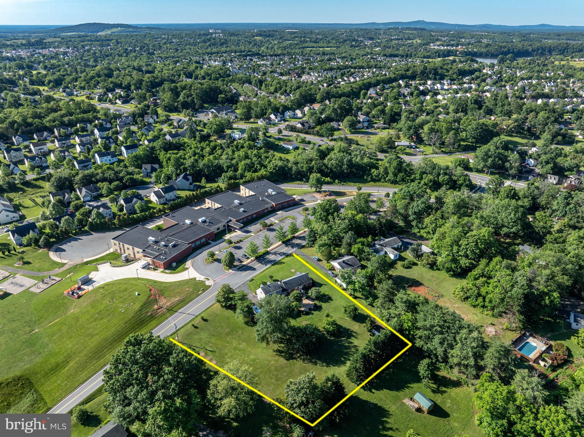 650 Yowell Drive Culpeper, VA 22701 - Photo 65 of 65 an aerial view of residential houses with outdoor space and trees