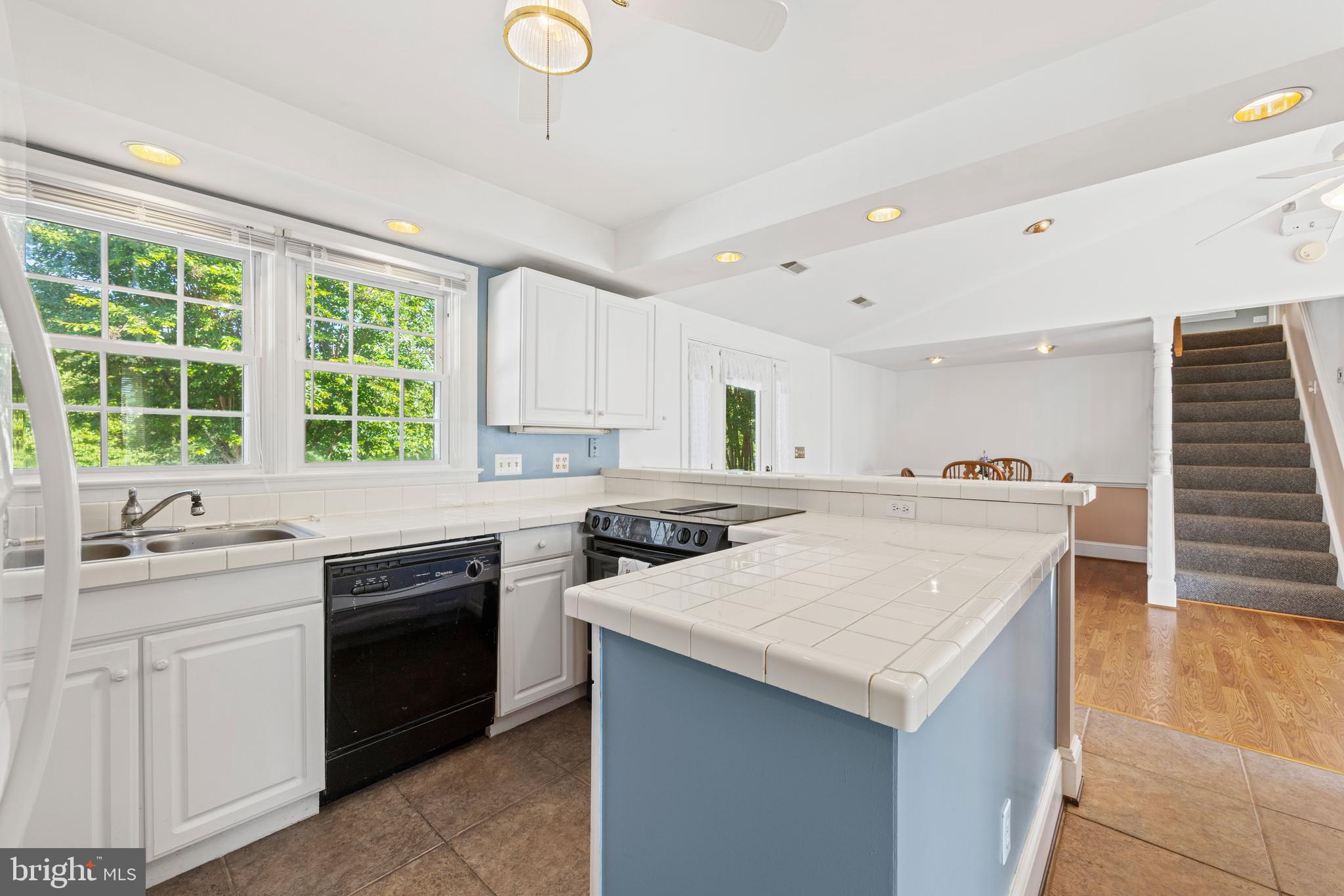 650 Yowell Drive Culpeper, VA 22701 - Photo 9 of 65 a kitchen with a sink stove and cabinets