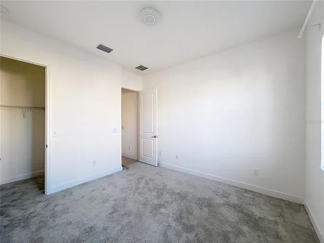 an empty room with an entryway