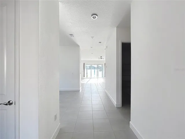 a view of hallway with stairs