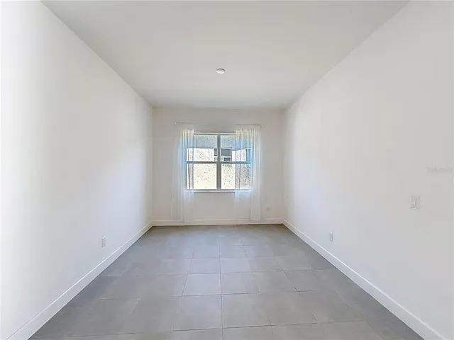 an empty room with a window