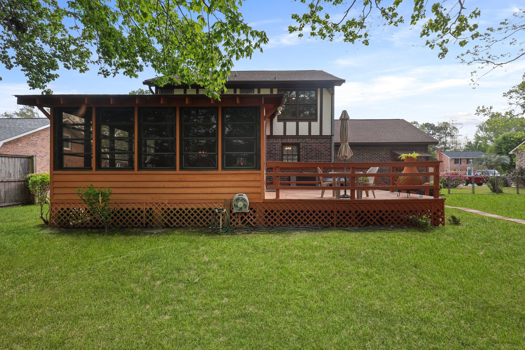 8147 Waltham Road North Charleston, SC 29406 - Photo 25 of 32 Showcasing 3-season room and deck