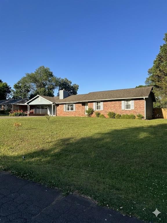 27 Carriage Trace Southeast Cartersville, GA 30121 - Photo 2 of 26 a view of a house with a yard