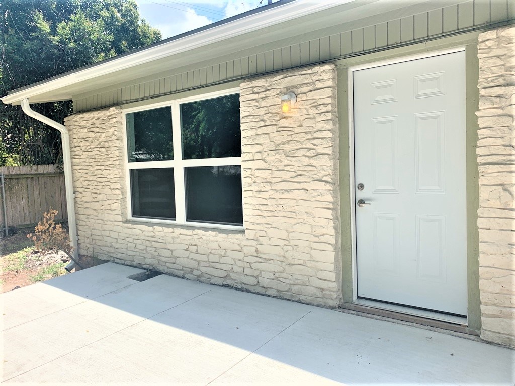 1503 Braes Ridge Drive, Unit B Austin, TX 78723 - Photo 1 of 1 a view of house with front door