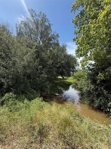 a view of outdoor space and trees all around