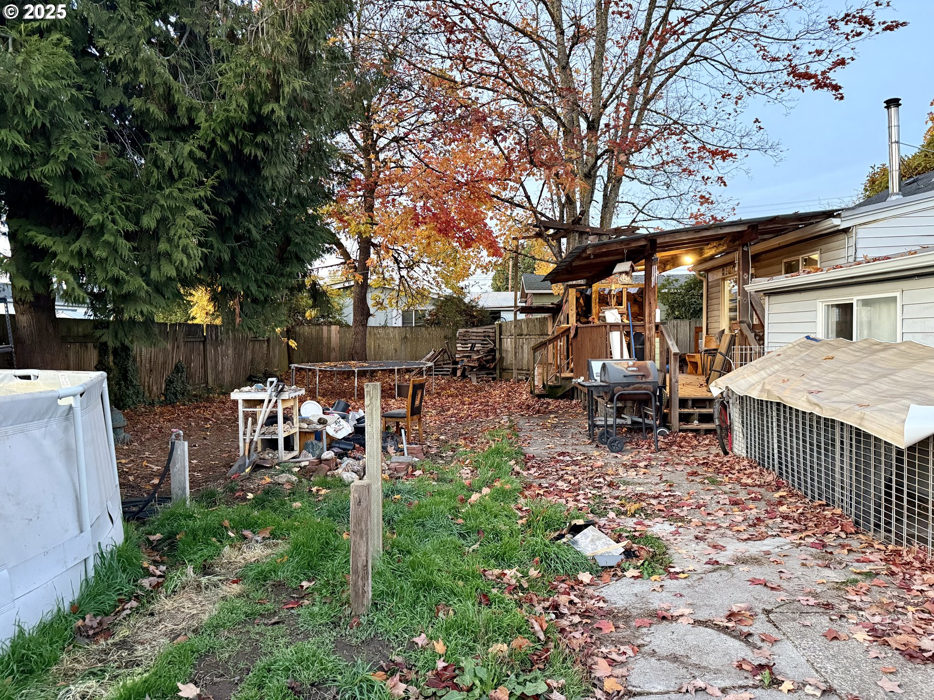 1470 Waite Street Eugene, OR 97402 - Photo 5 of 5 a view of a chairs and tables in the back yard of the house