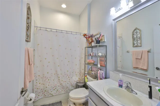 a bedroom with a bed and furniture