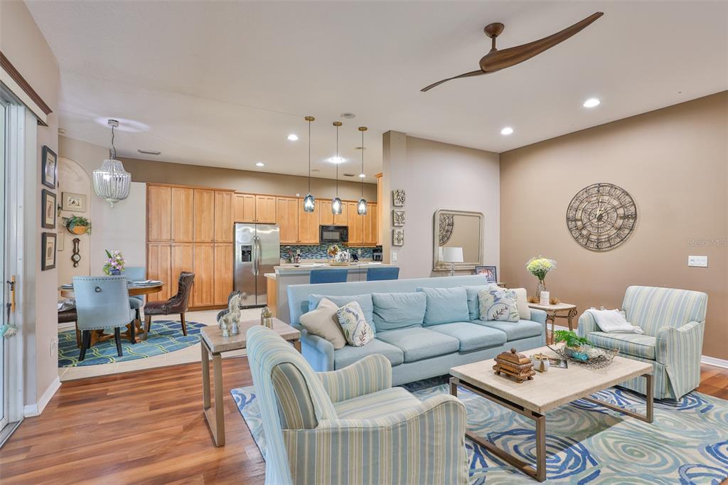 1204 Facet View Way Valrico, FL 33594 - Photo 26 of 59 a living room with furniture kitchen view and a table