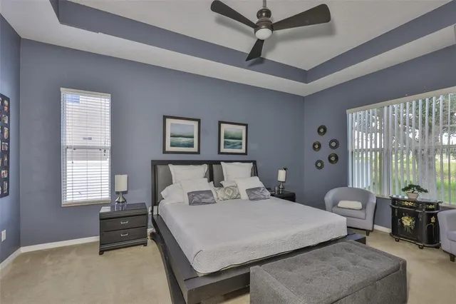 a living room with furniture a dining table and chairs