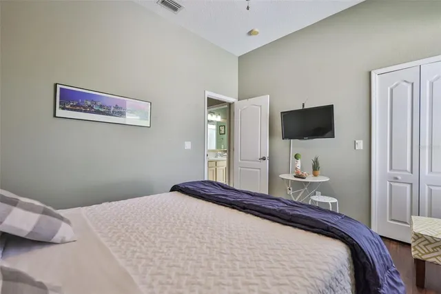 an aerial view of residential houses with outdoor space and swimming pool