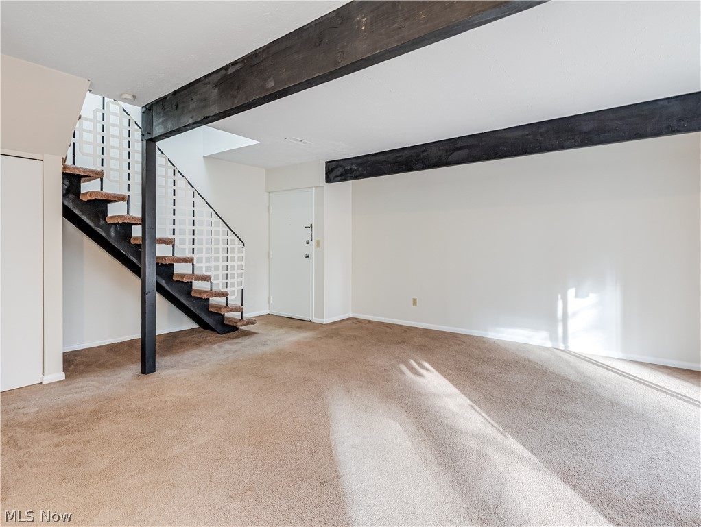 2550 Chamberlain Road, Unit A3 Akron, OH 44333 - Photo 5 of 21 Living room light colored carpet
