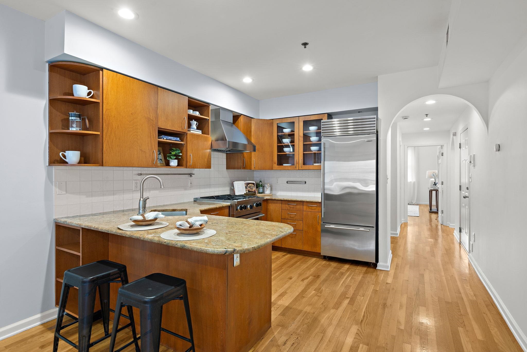 95 Garden Street, Unit 3A Hoboken, NJ 07030 - Photo 11 of 22 a kitchen that has a table and chairs in it