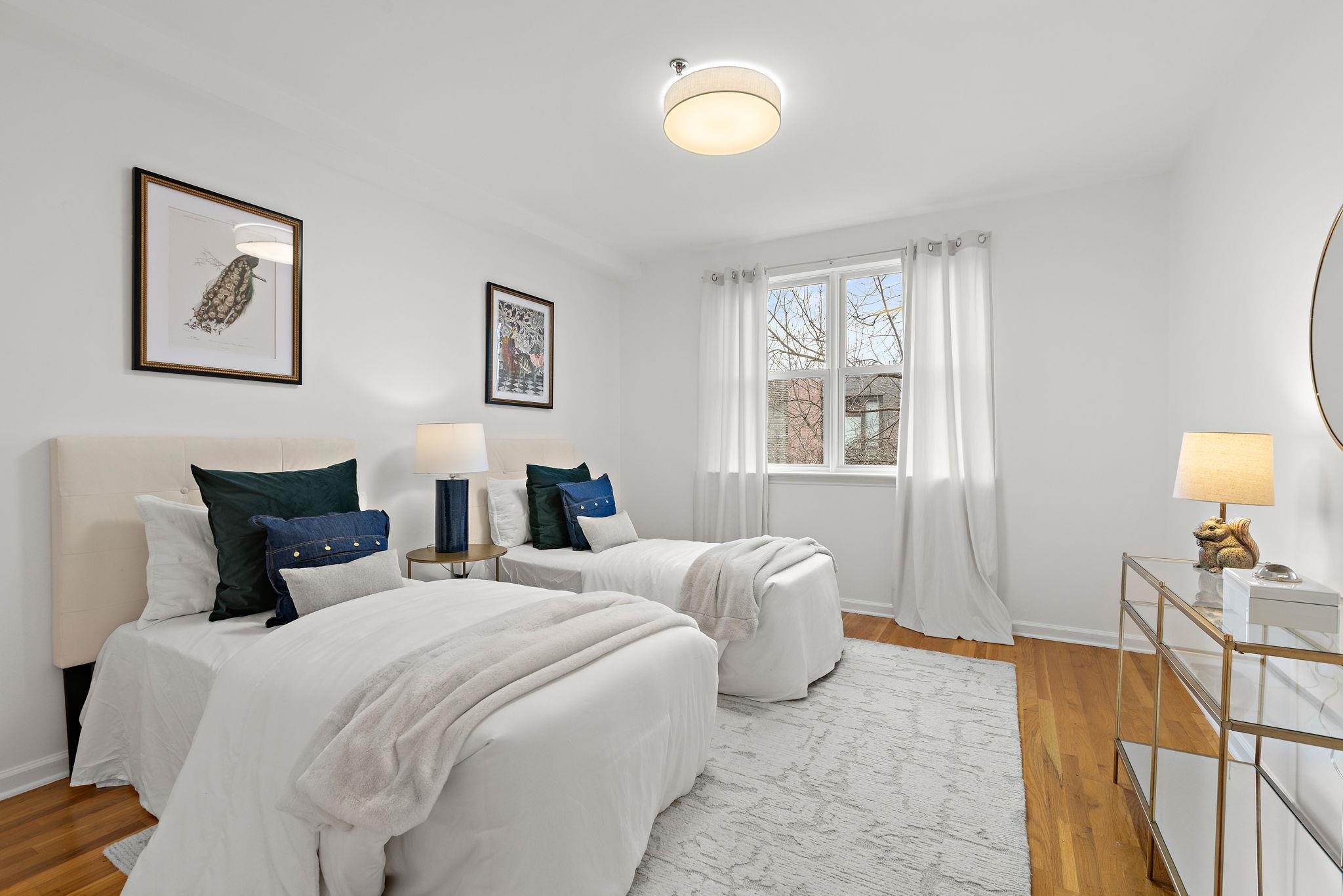 95 Garden Street, Unit 3A Hoboken, NJ 07030 - Photo 15 of 22 a bedroom with double bed and a window