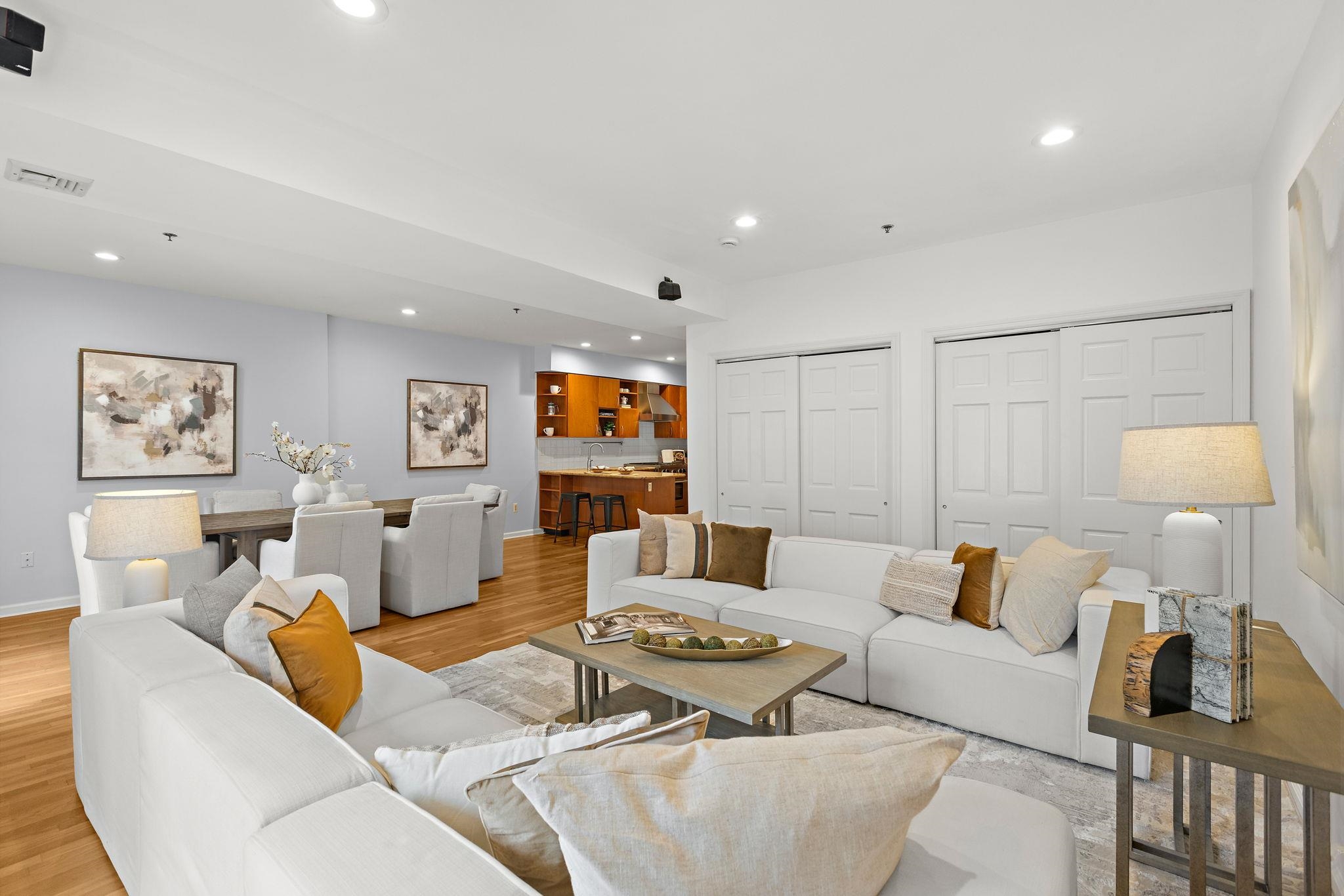 95 Garden Street, Unit 3A Hoboken, NJ 07030 - Photo 3 of 22 a living room with furniture and a lamp