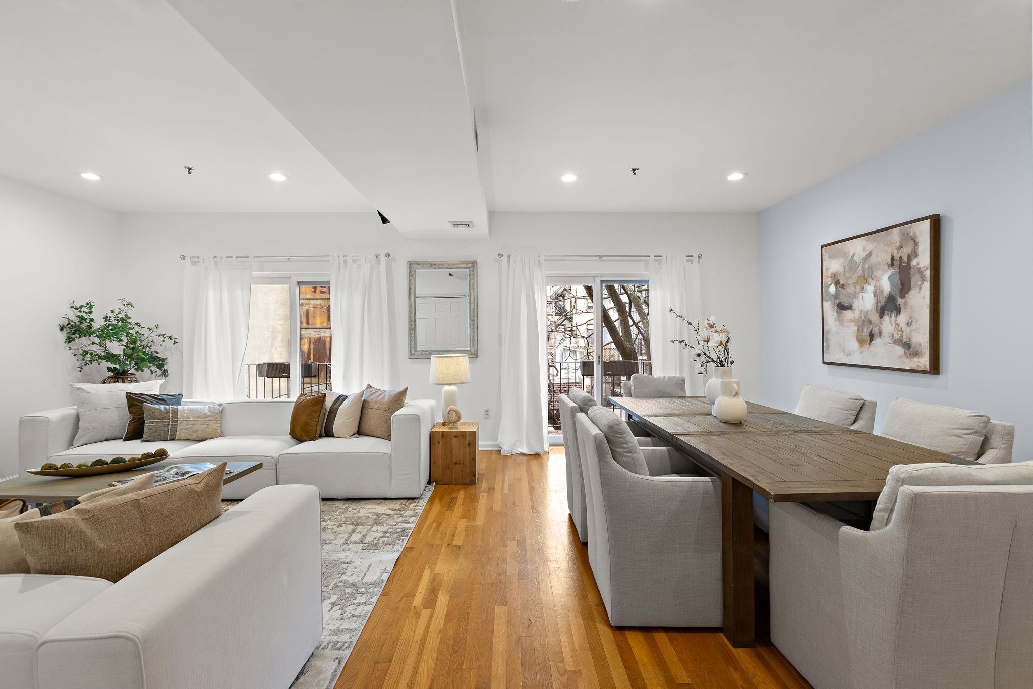95 Garden Street, Unit 3A Hoboken, NJ 07030 - Photo 5 of 22 a living room with furniture and a table