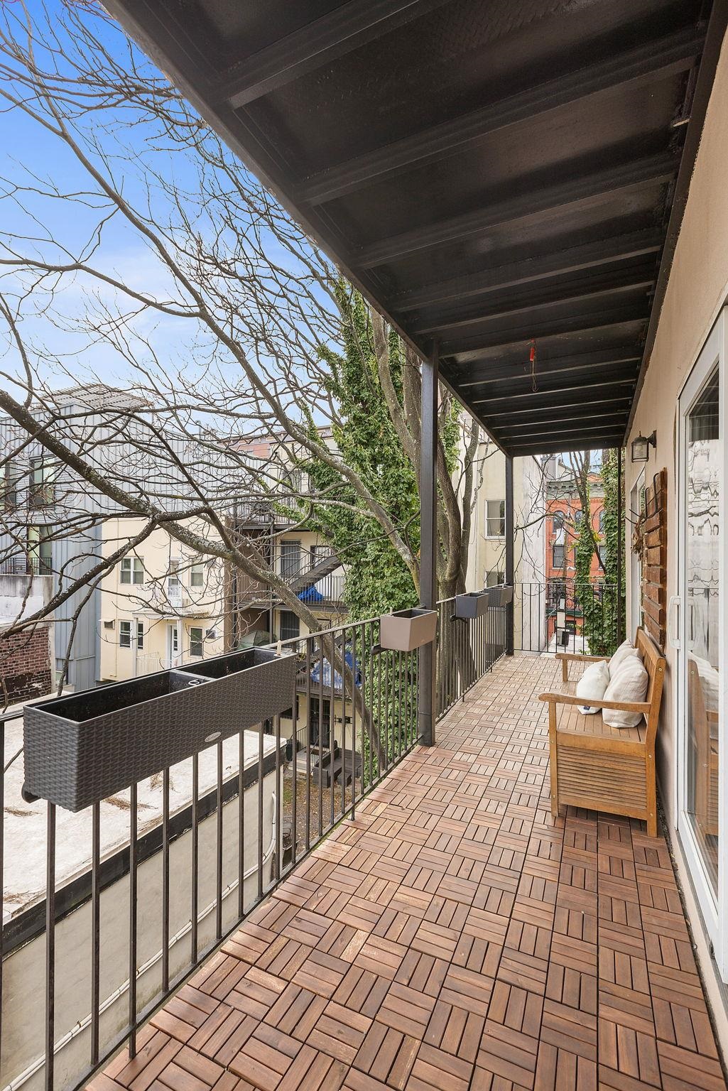 95 Garden Street, Unit 3A Hoboken, NJ 07030 - Photo 8 of 22 a view of balcony with couch
