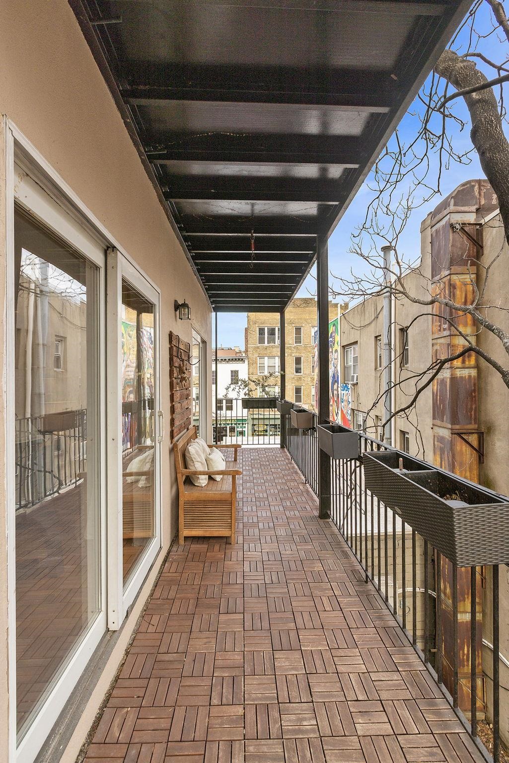 95 Garden Street, Unit 3A Hoboken, NJ 07030 - Photo 9 of 22 a view of a porch with wooden floor