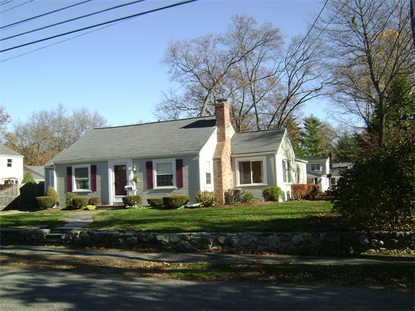 9 Longfellow Road Natick, MA 01760 - Photo 1 of 1 a front view of a house with a garden
