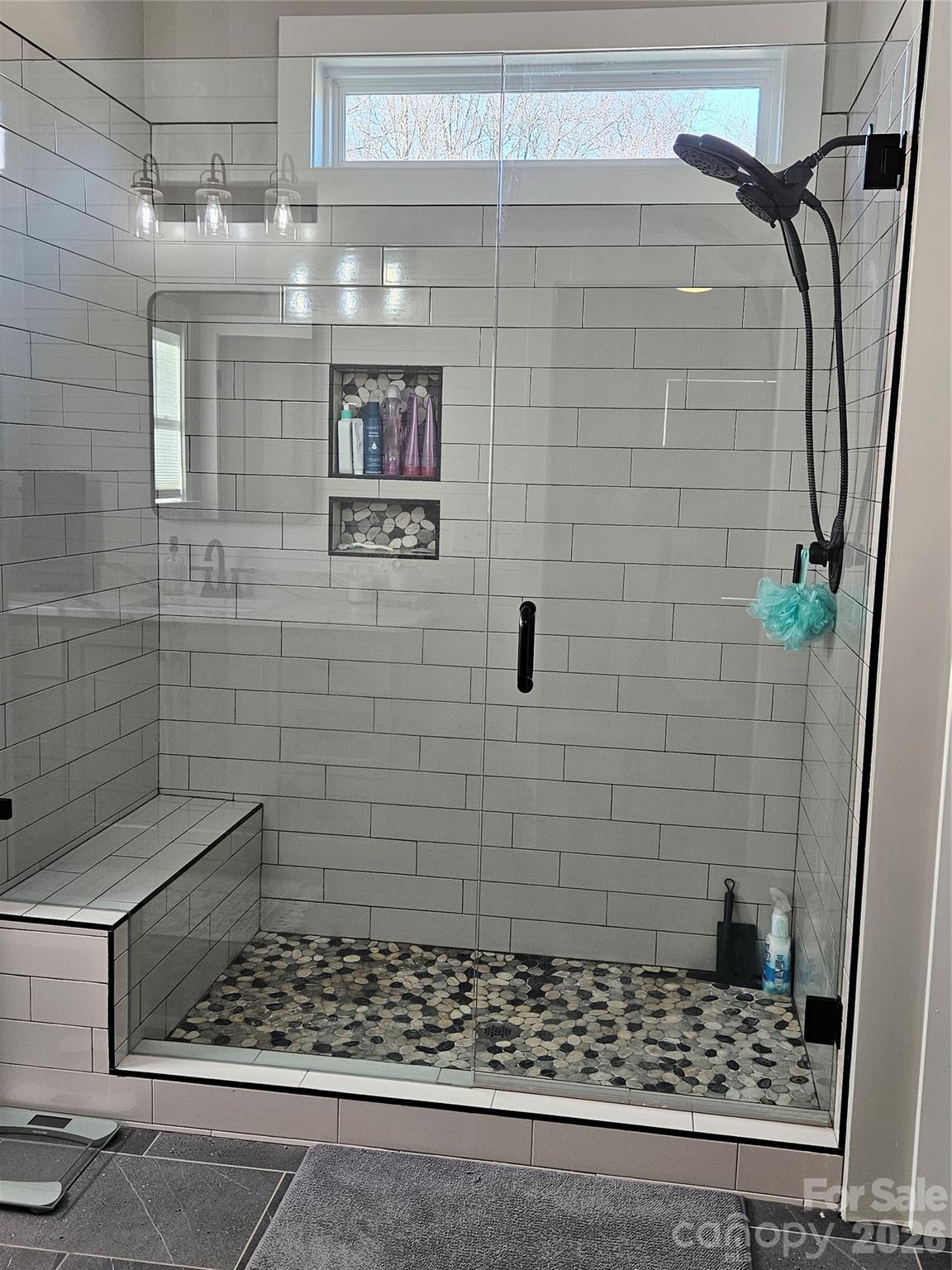 6512 Medlin Road Monroe, NC 28112 - Photo 15 of 28 a bathroom with a shower