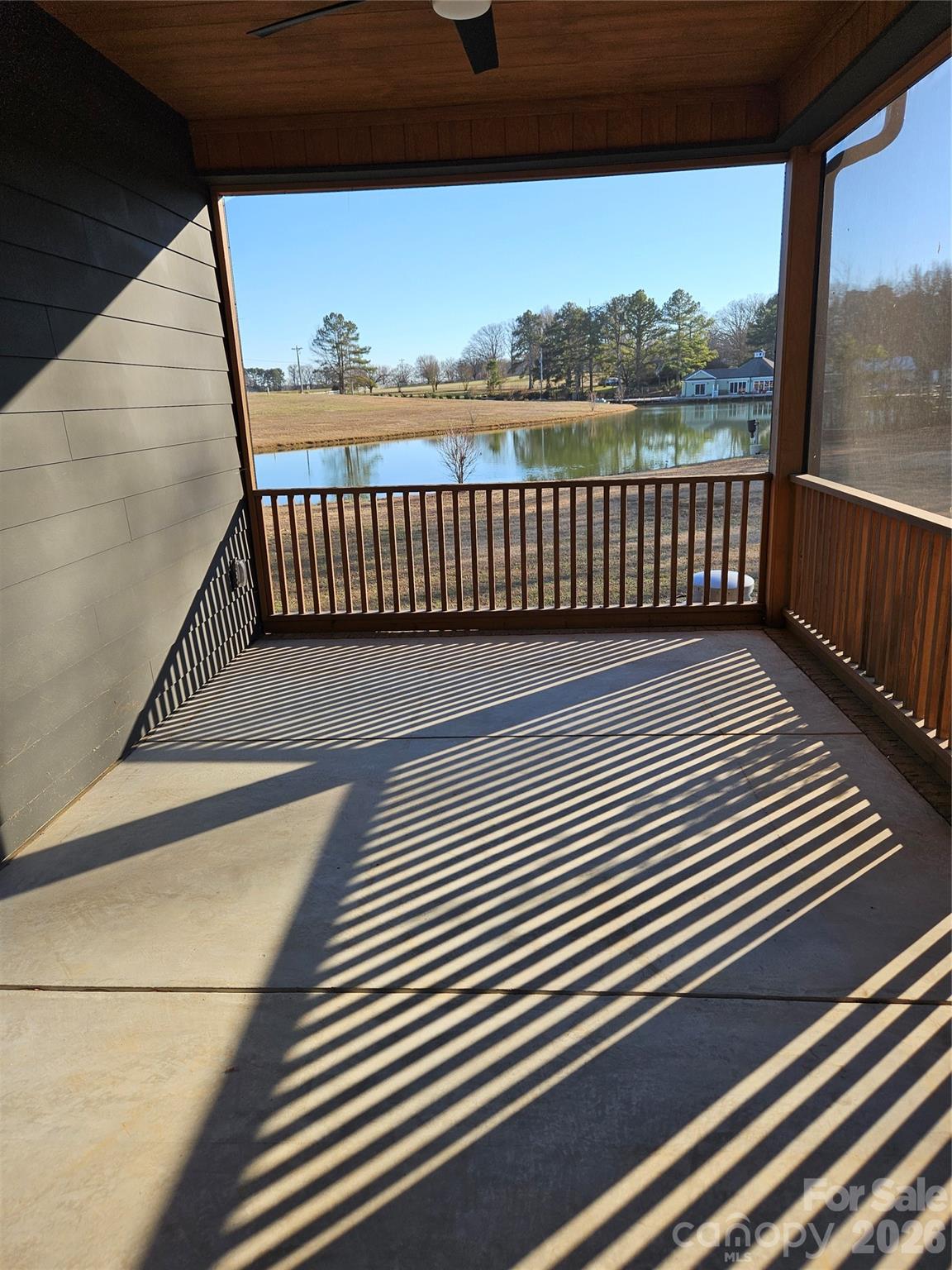 6512 Medlin Road Monroe, NC 28112 - Photo 25 of 28 a view of a balcony with wooden floor