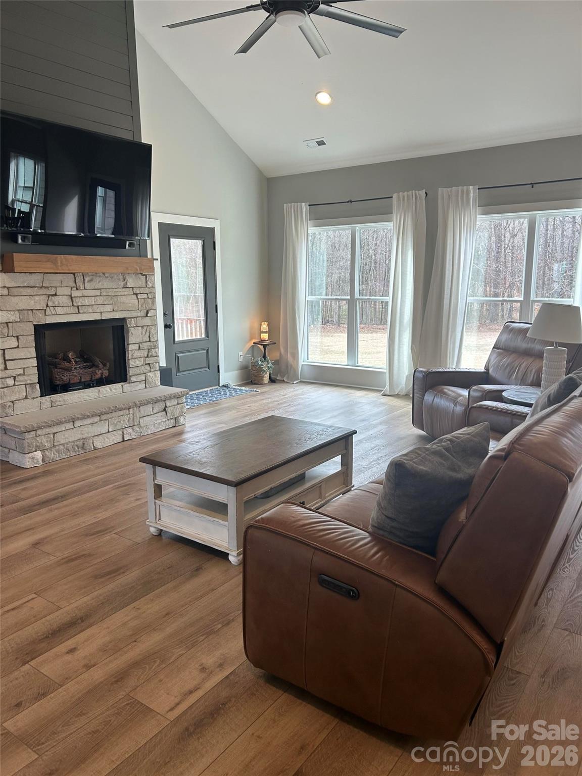 6512 Medlin Road Monroe, NC 28112 - Photo 6 of 28 a living room with furniture and a fireplace
