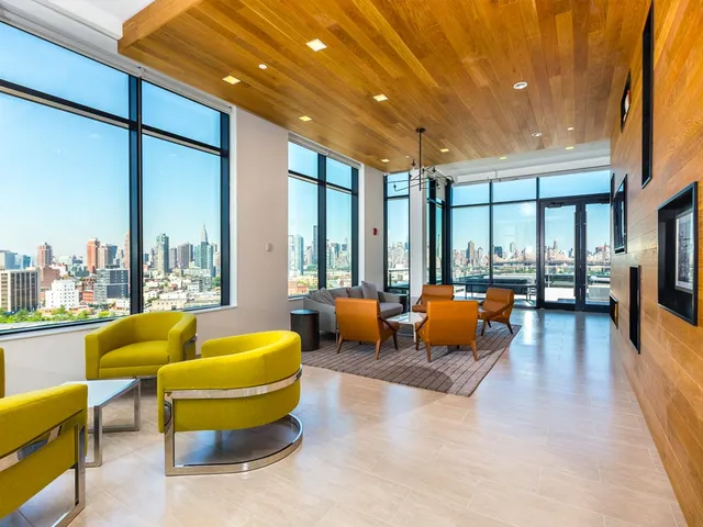 a lobby with furniture and outdoor seating