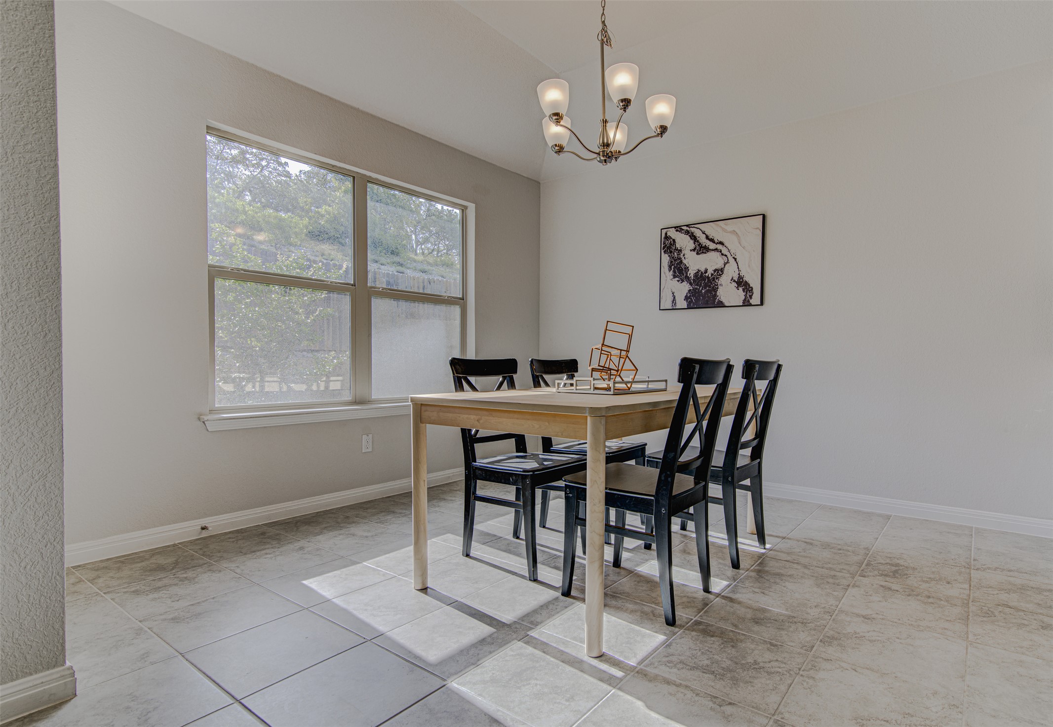 316 Pepper Mill Loop Burnet, TX 78611 - Photo 8 of 27 Natural light floods this inviting dining space, ideal for memorable meals and entertaining.
