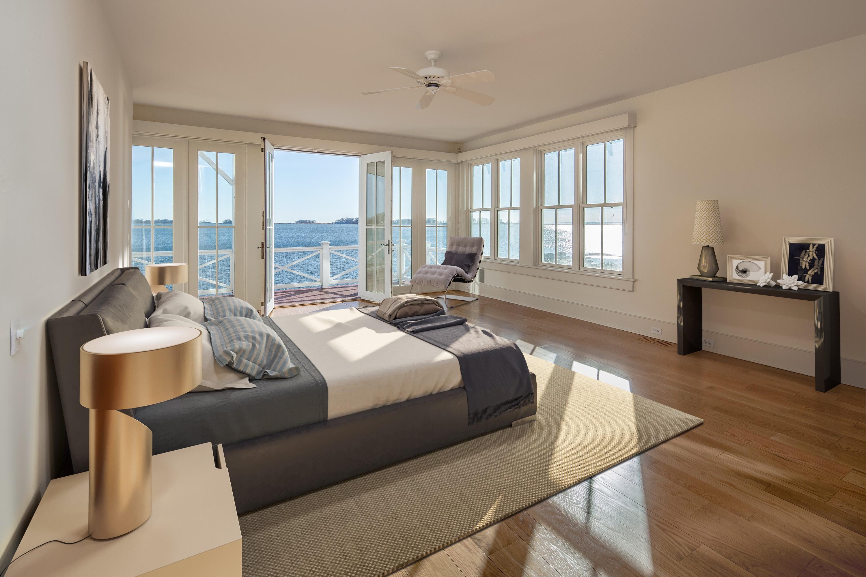 1-2 Rocky Point Road Rowayton, CT 06853 - Photo 17 of 38 a bed room with a bed and a couch