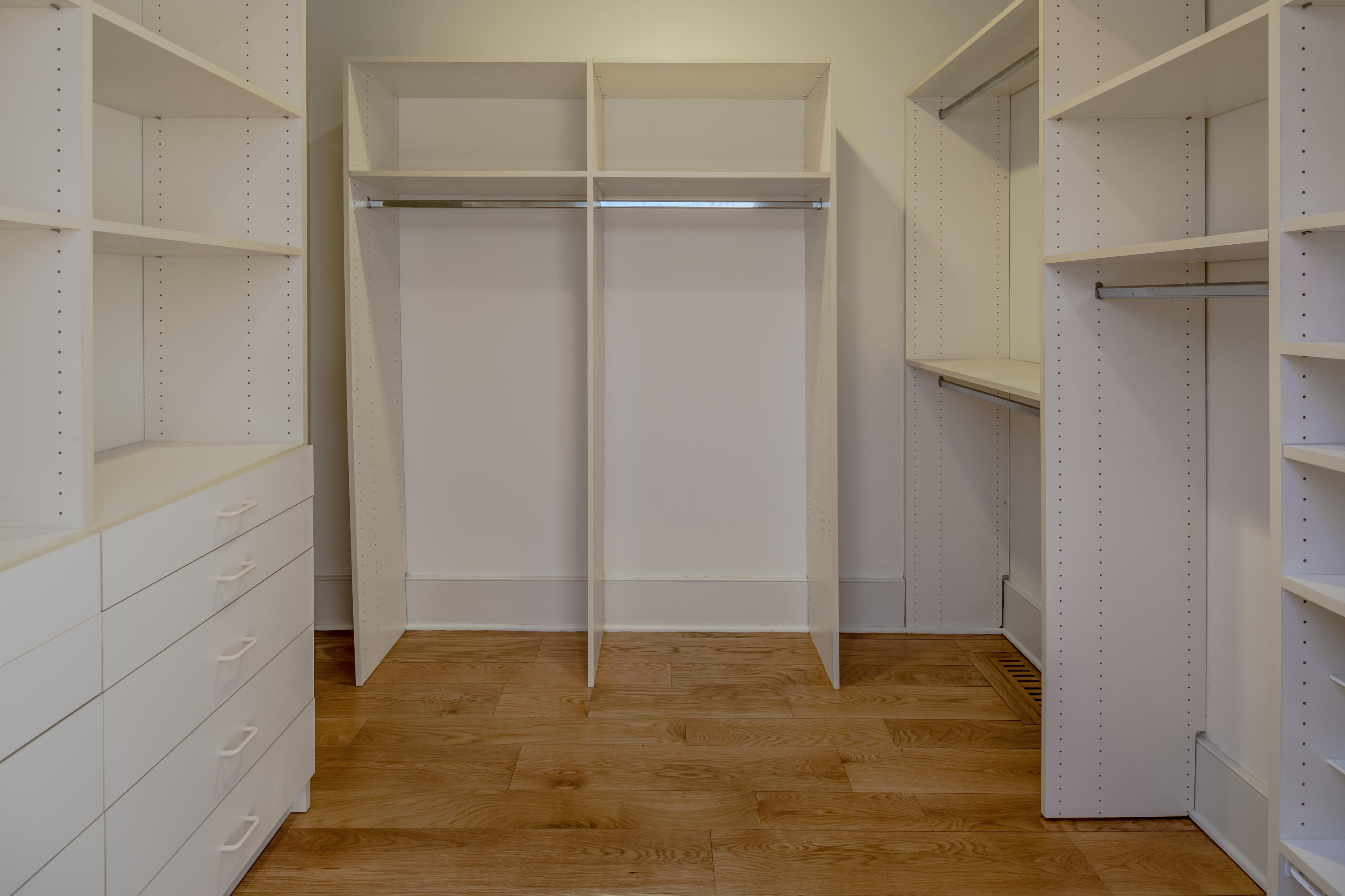 1-2 Rocky Point Road Rowayton, CT 06853 - Photo 19 of 38 a view of an empty walk in closet