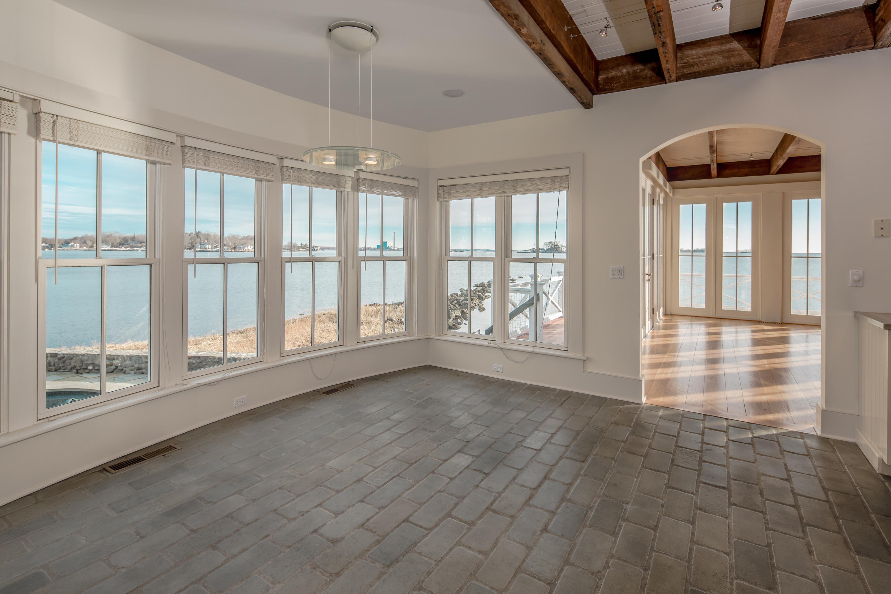 1-2 Rocky Point Road Rowayton, CT 06853 - Photo 20 of 38 a view of an empty room with a window