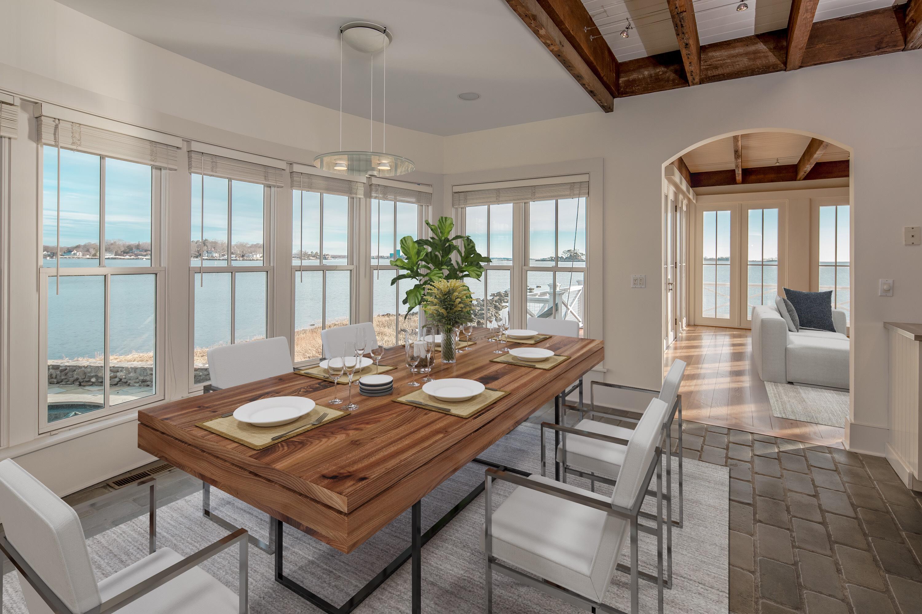 1-2 Rocky Point Road Rowayton, CT 06853 - Photo 21 of 38 a view of a livingroom with furniture and window