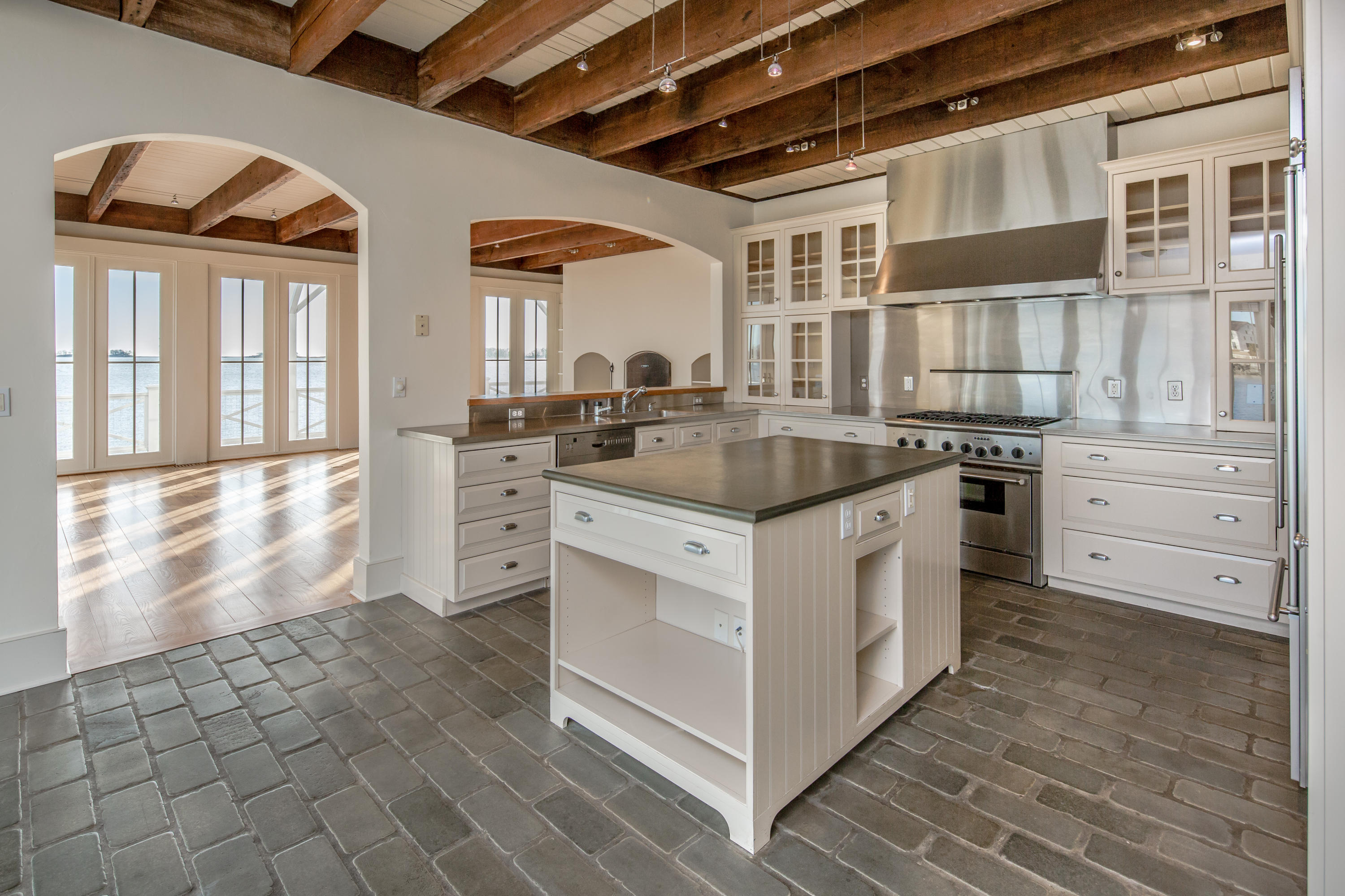 1-2 Rocky Point Road Rowayton, CT 06853 - Photo 23 of 38 a kitchen with stainless steel appliances granite countertop a stove and a sink
