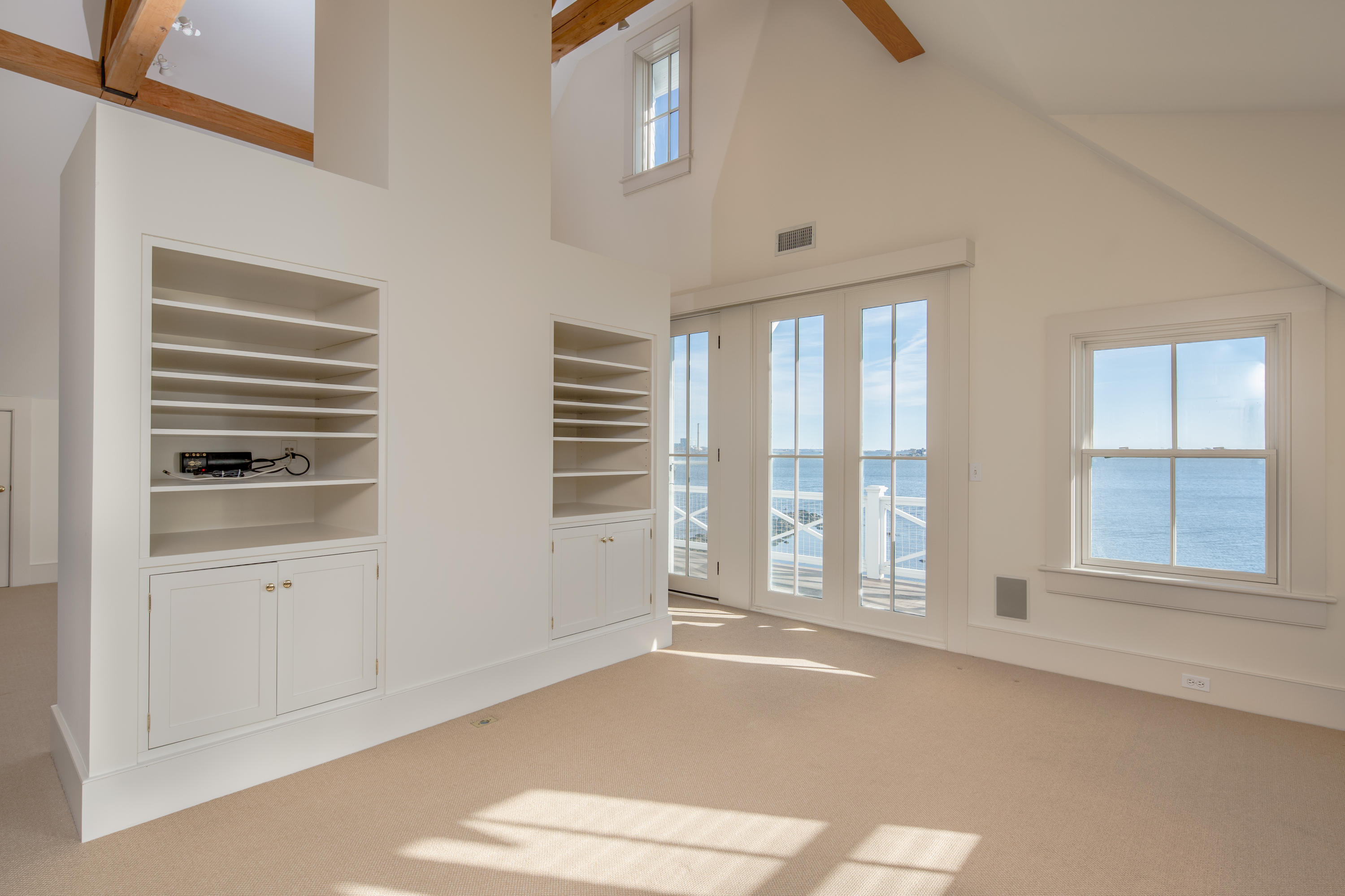 1-2 Rocky Point Road Rowayton, CT 06853 - Photo 30 of 38 a view of an empty room with a window