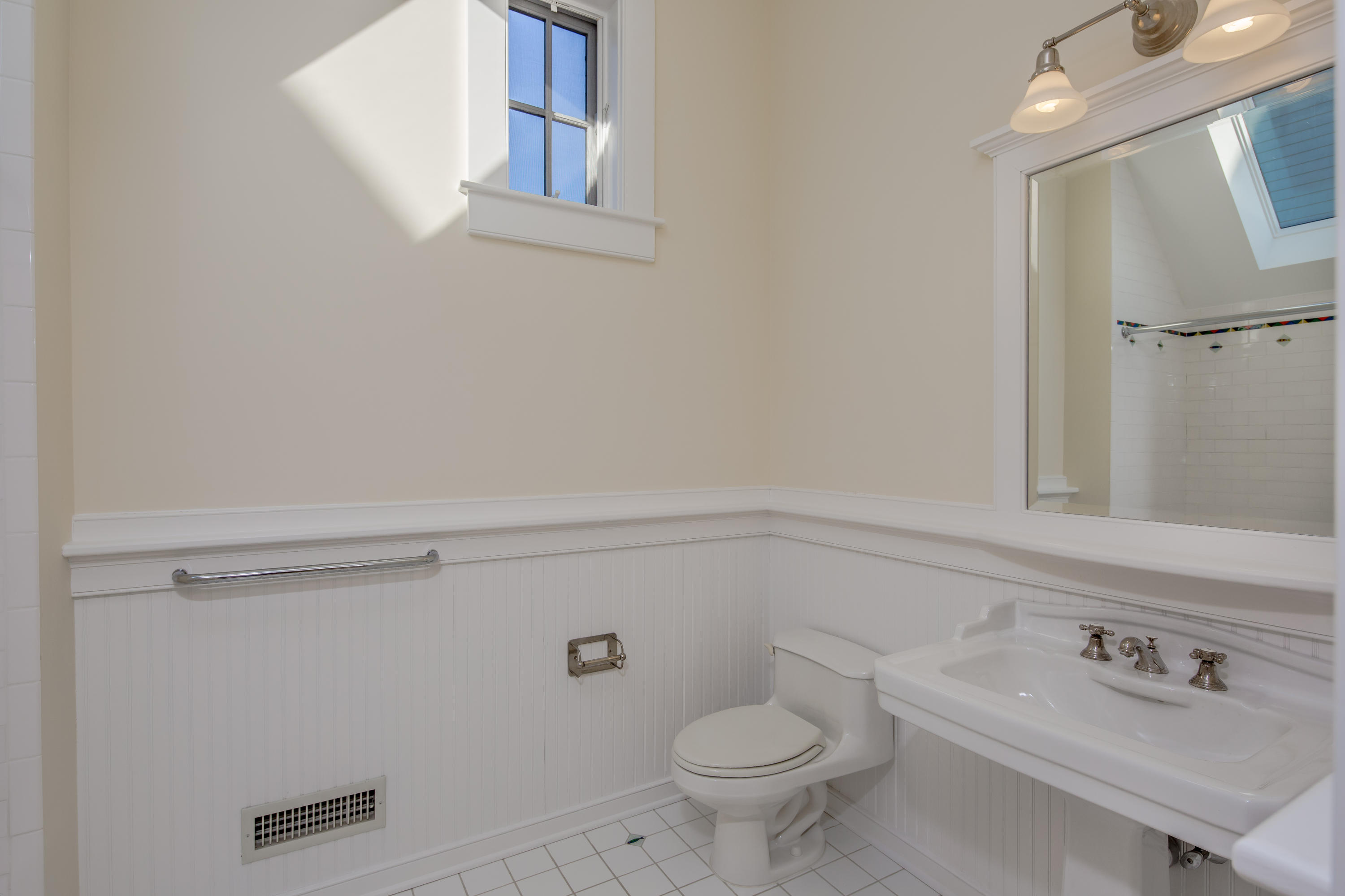 1-2 Rocky Point Road Rowayton, CT 06853 - Photo 35 of 38 a bathroom with a sink a toilet and shower