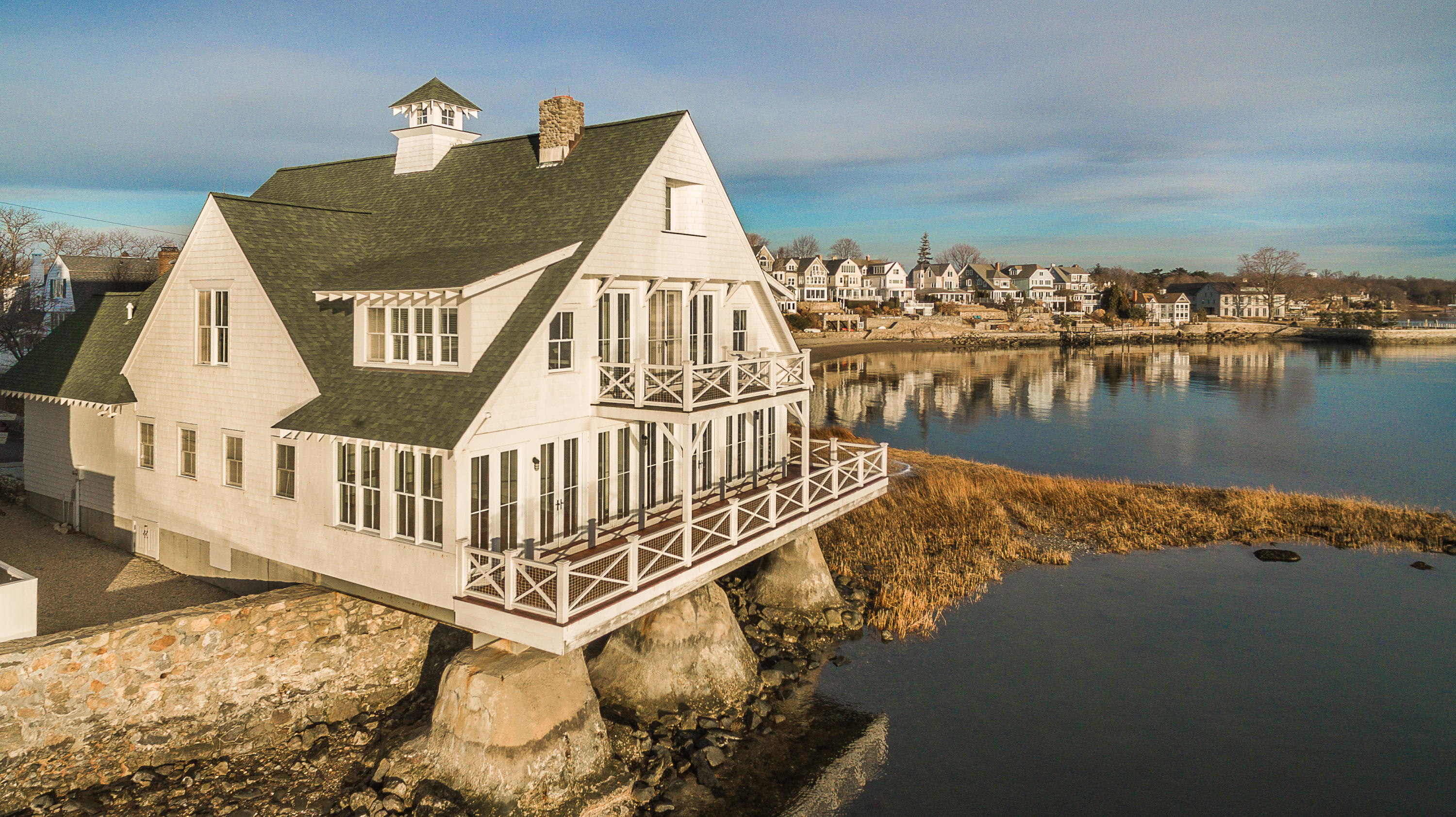 1-2 Rocky Point Road Rowayton, CT 06853 - Photo 4 of 38 a view of a lake with roof deck