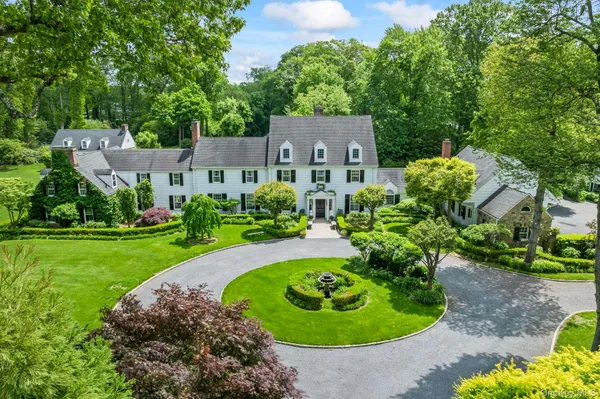 a view of a garden with a swimming pool