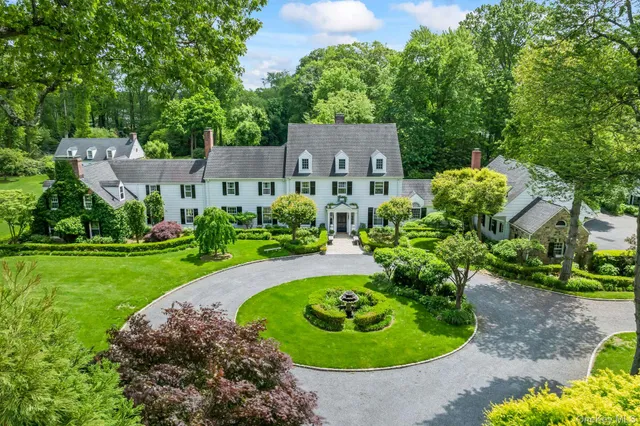 a view of a garden with a swimming pool