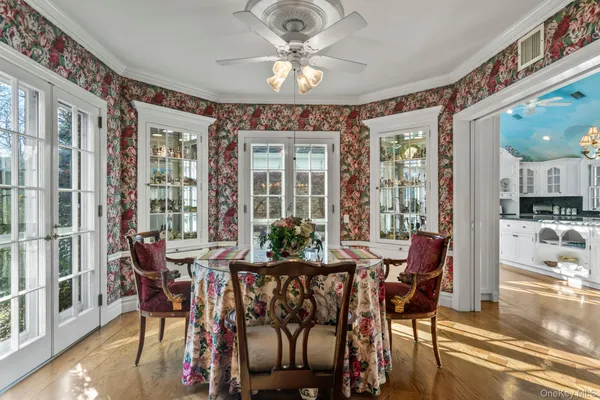 a view of a dining room with furniture window and outside view