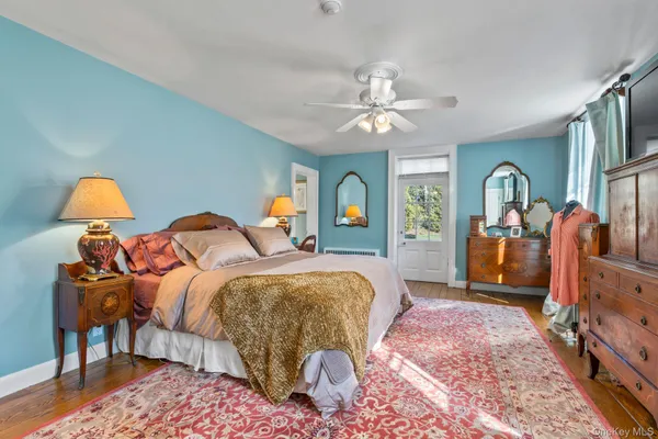 a living room with furniture fireplace and a flat screen tv