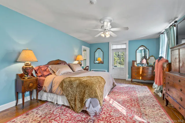 a living room with furniture fireplace and a flat screen tv