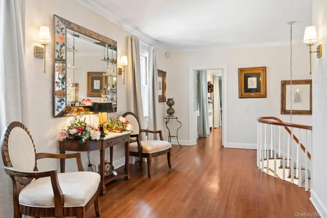 a spacious bathroom with double sink a mirror a vanity and a shower