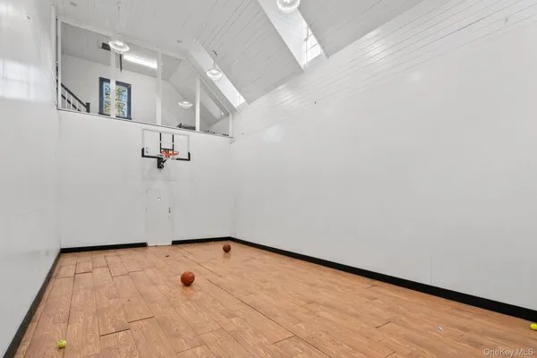 a small yard with fountain and flowers
