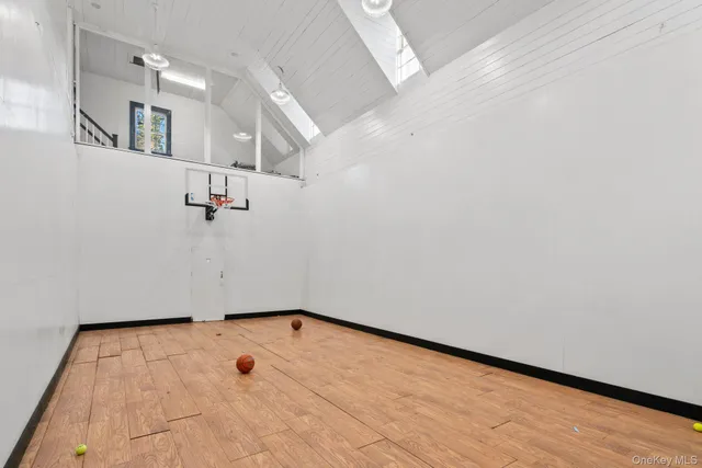 a small yard with fountain and flowers