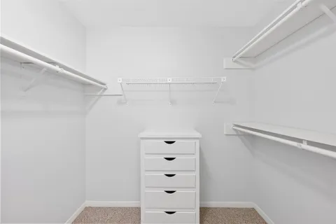 a view of an empty walk in closet