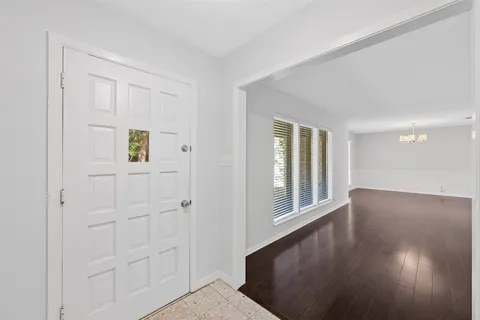 a view of an empty room and window