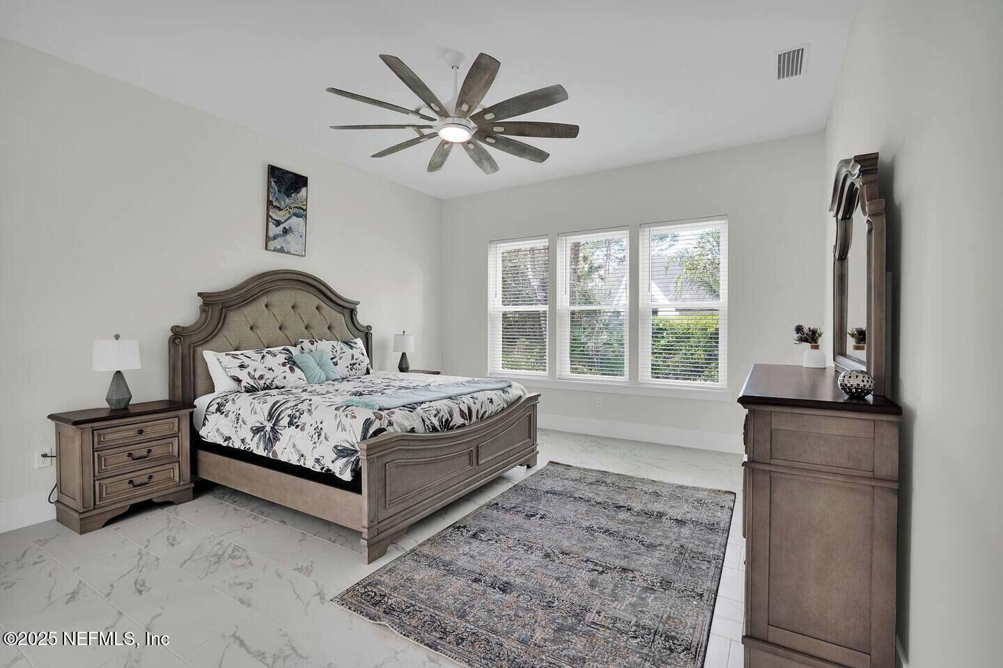 586 A1A North Ponte Vedra Beach, FL 32082 - Photo 14 of 29 a bedroom with a bed and a window