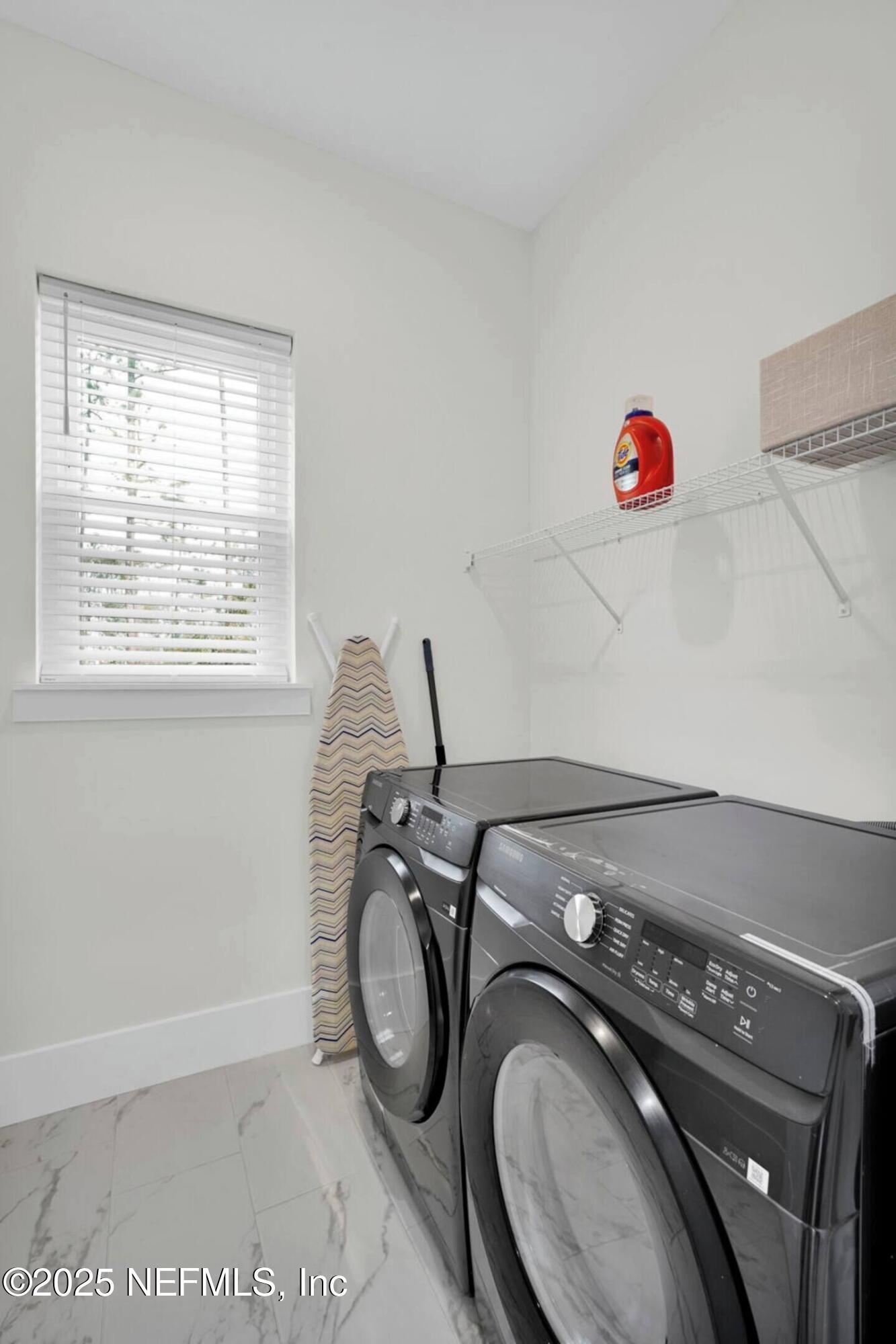 586 A1A North Ponte Vedra Beach, FL 32082 - Photo 20 of 29 a utility room with dryer and washer