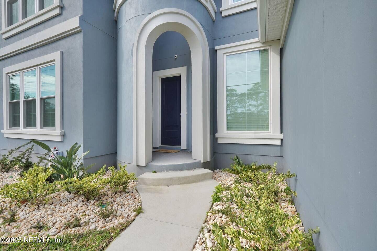 586 A1A North Ponte Vedra Beach, FL 32082 - Photo 2 of 29 a front view of a house