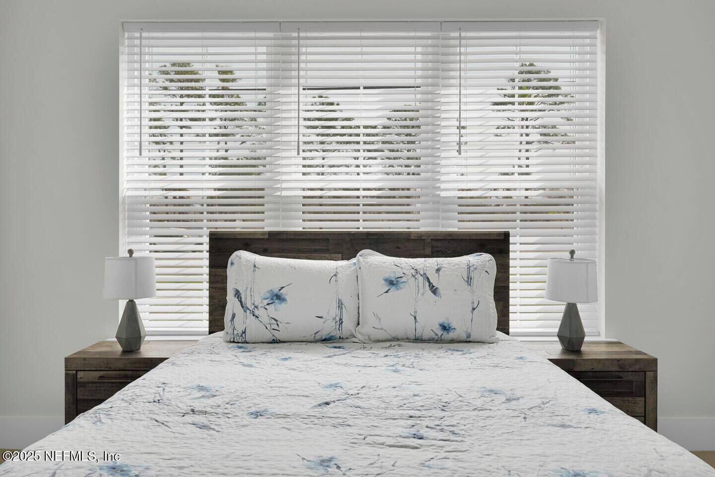 586 A1A North Ponte Vedra Beach, FL 32082 - Photo 22 of 29 a view of a bed in a bedroom